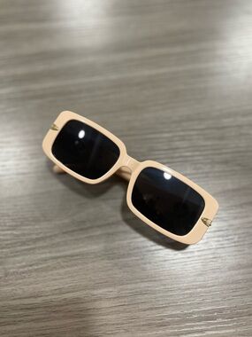 Blush pink square sunglasses with gold flower accents